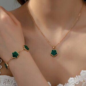 Gold Clover Pendant Necklace with Emerald Green Accent